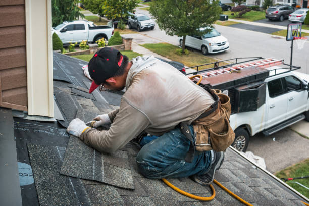 Professional Roof Replacement technician working in Edgewater, NJ